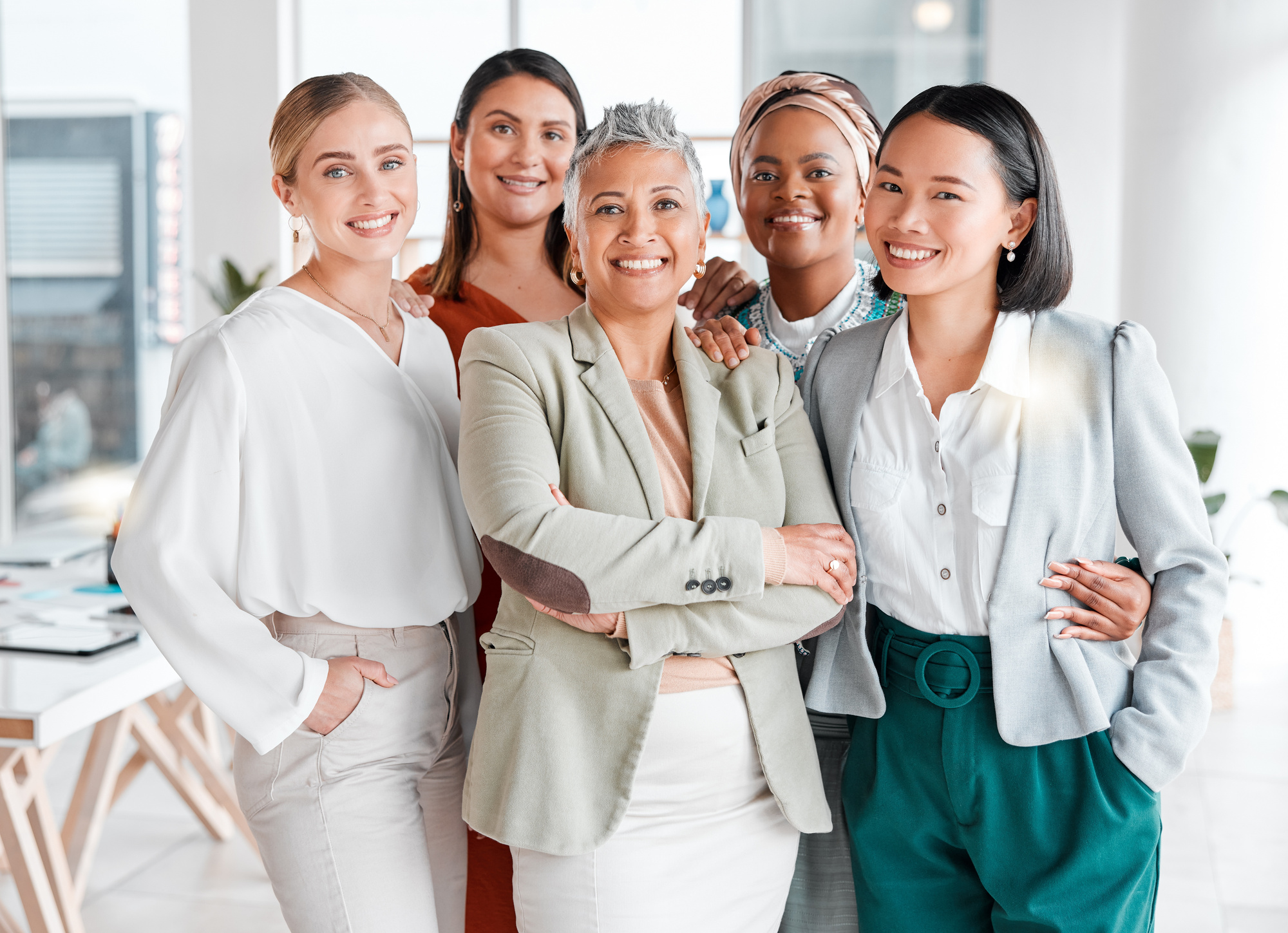 a diverse group of confident women in a professional setting